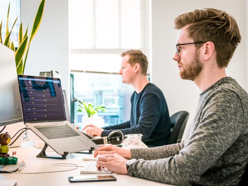 A focused team member replying to conversations at a workstation