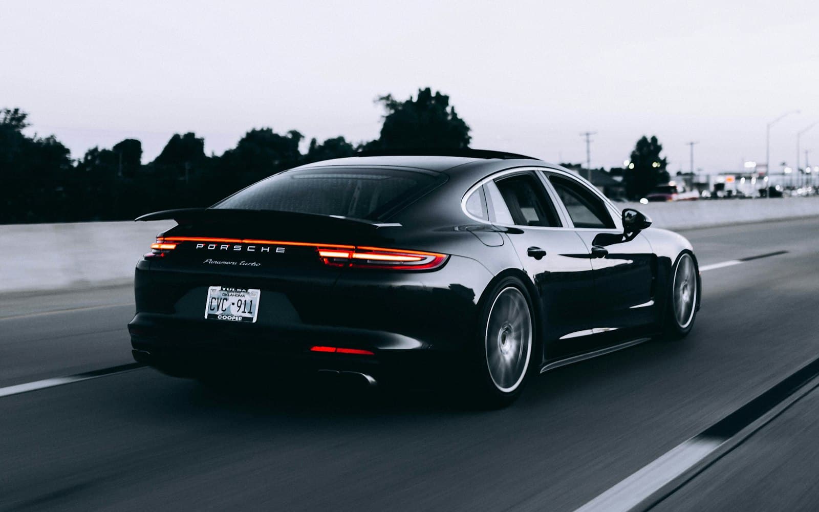 A car on a wet evening road — the test-drive no-show is a CRM problem, not a “we need a better chatbot” problem.