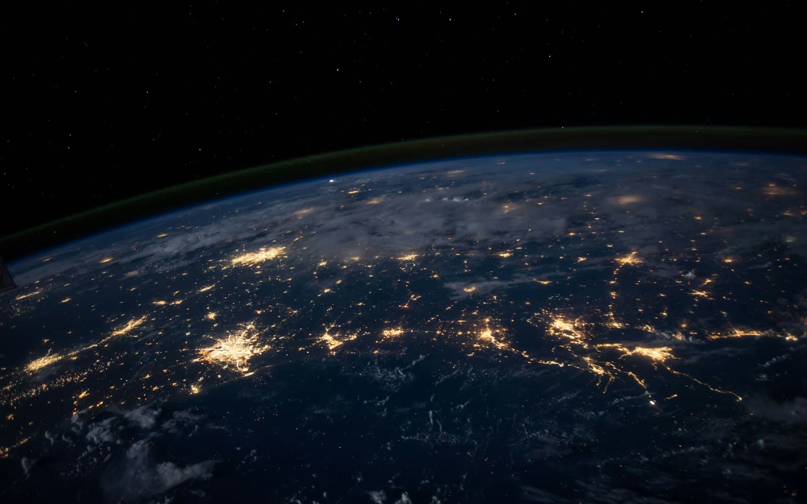 Earth from orbit — connectivity at scale is not the same as a named owner on a 9:40 pm parent thread.
