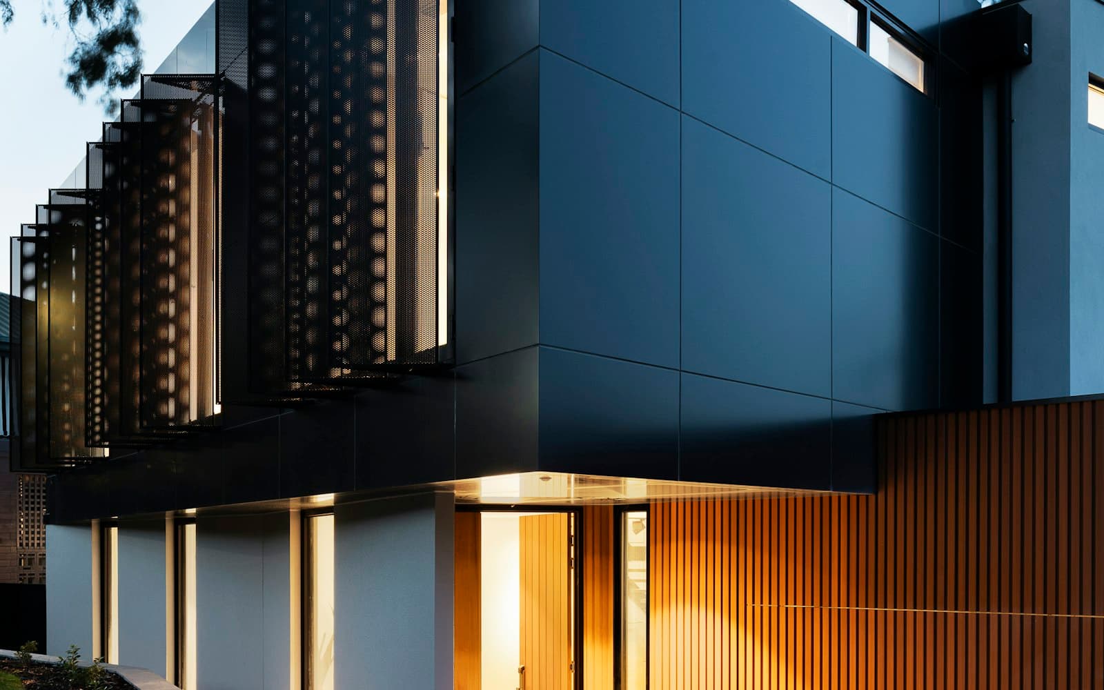 A modern house entrance at dusk — available on the card has to match the message you just sent.