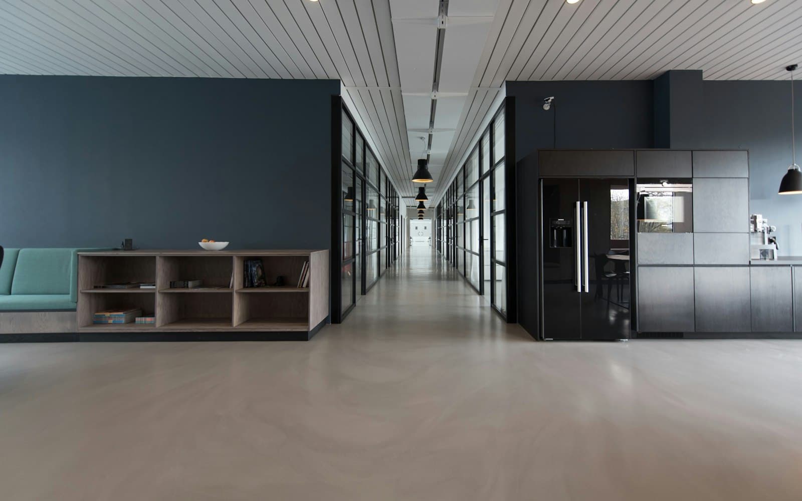 An office corridor — retainers and cases need a desk, not a second WhatsApp number per partner.
