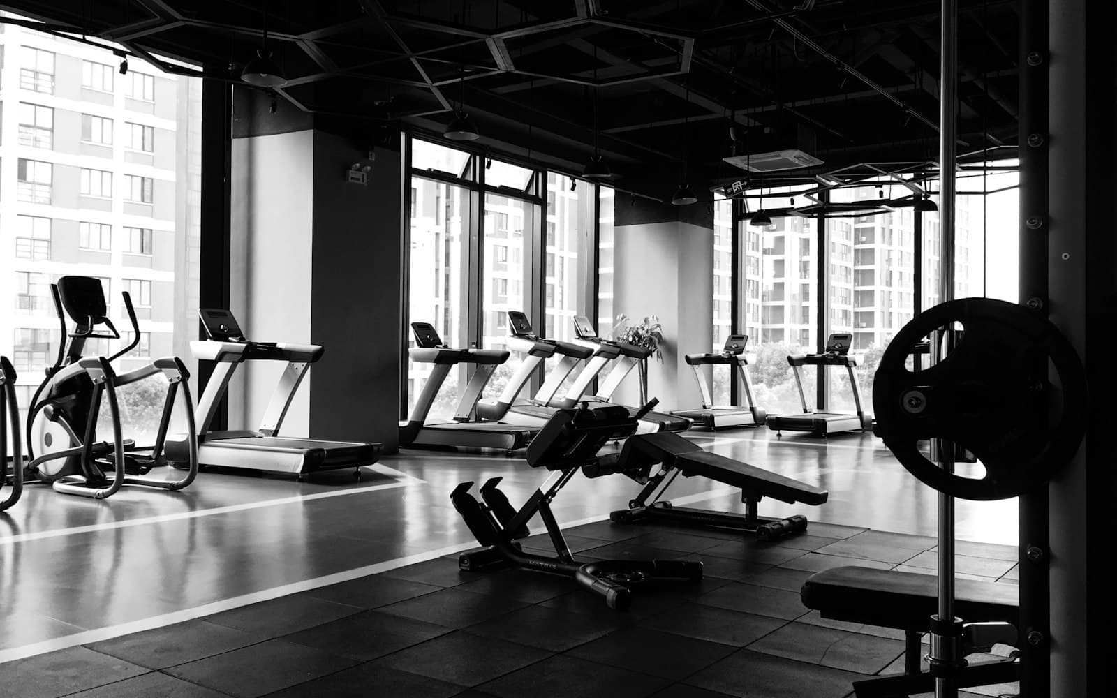 An empty cardio floor in daylight — a trial that never booked the second class is a CRM miss, not a programming miss.